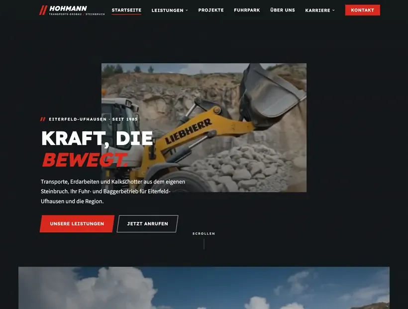 Website von Hohmann Fuhr- und Baggerbetrieb: dunkler Auftritt mit Radlader im Steinbruch